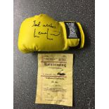 Signed Lennox Lewis boxing glove with COA.