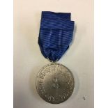 Police 8 years LSGC medal.