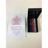 RAF Interest Bomber Command medal clasp unused in box and with issue slip.