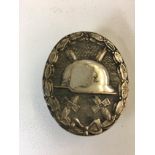 WWII Style German silver wound badge, solid type marked 30.