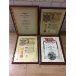 Four framed WWII German spanish order certificates.