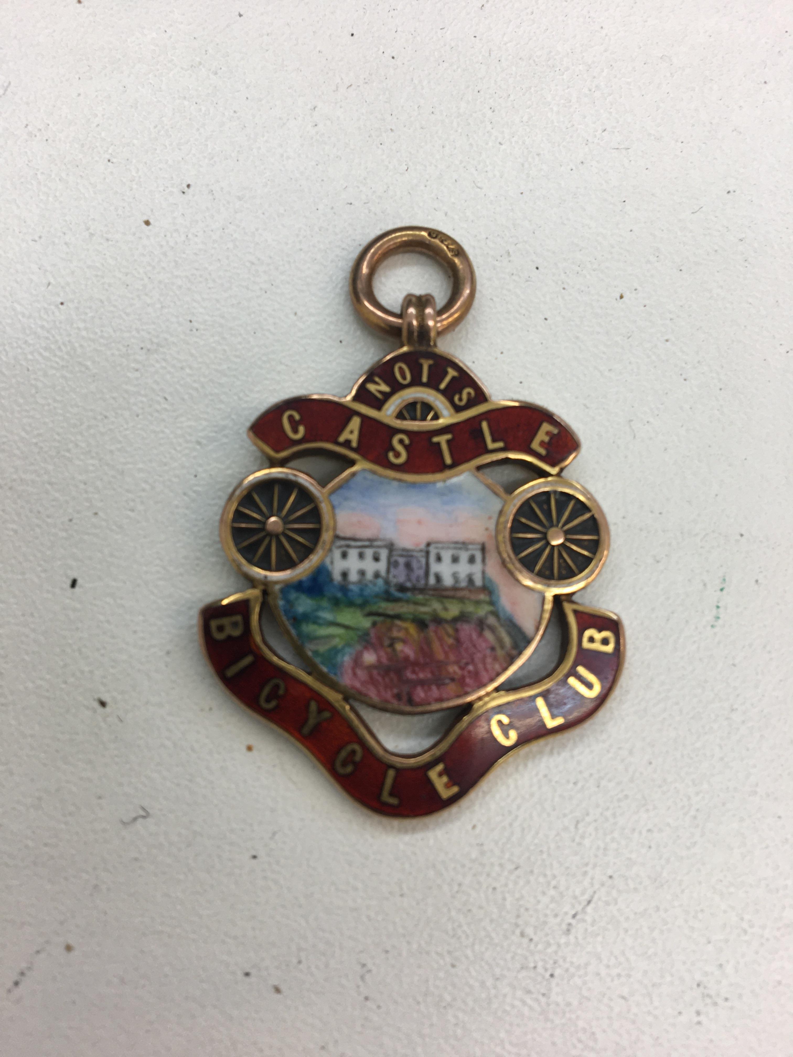 9ct 1930`s enamelled Cycling badge "Notts Castle Bicycle Club" reverse engraved "1930 presented by H