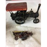Steam tractor model and unfinished metal model