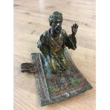 Cold painted bronze of an Arab man on carpet signed Namgreb to base, excellent condition
