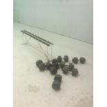 Quantity of welded dumbbell weights on stand ranging from 40-50kg each pair
