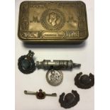 WWI Princess Mary tin, with Royal Marine badges, whistle and sweetheart badge.