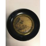 Napoleonic POW coloured straw picture in round frame.label to verso dated 1789.