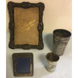 HM silver items to include photo frames and continental silver beakers.