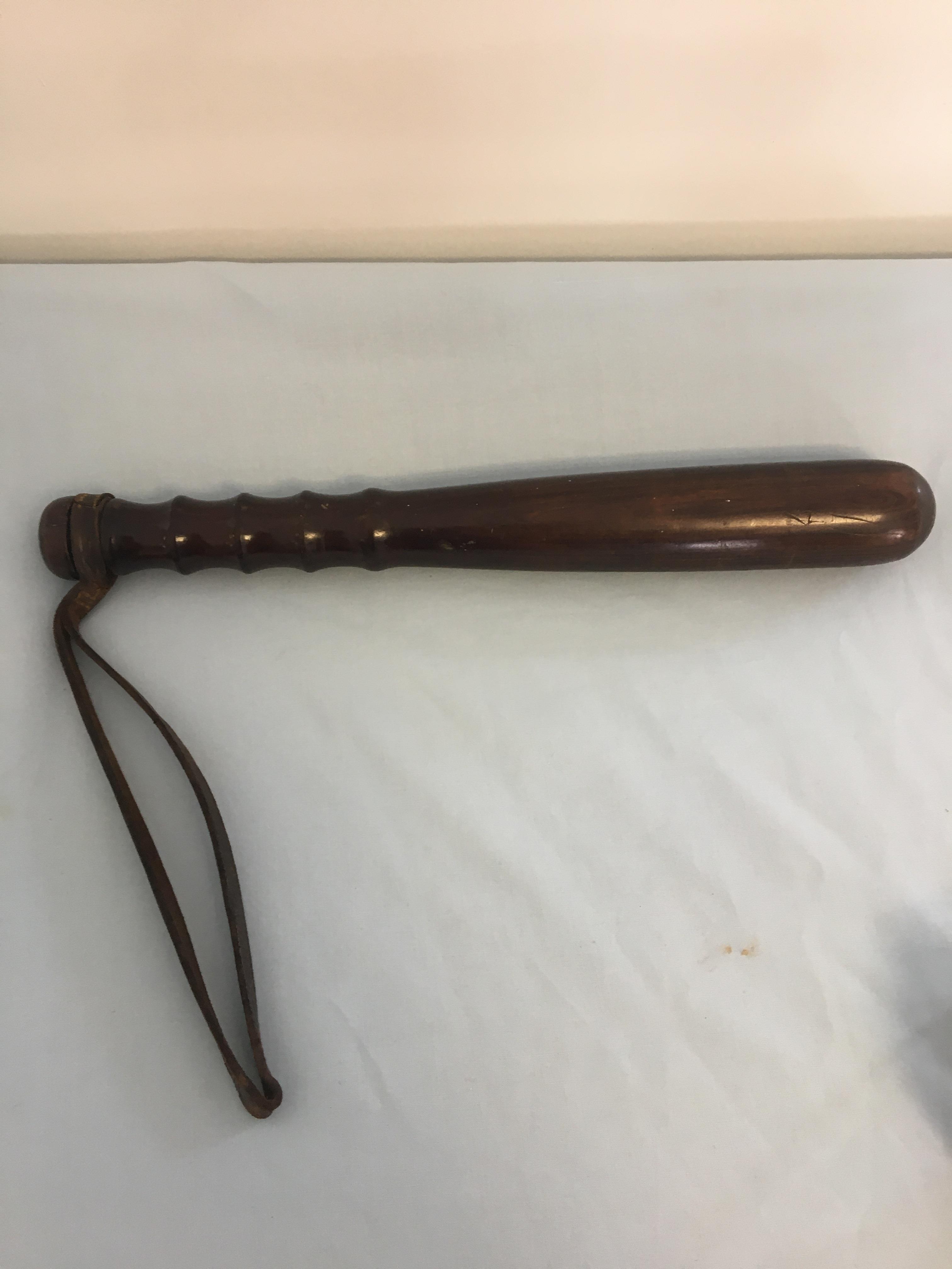 19th C short Lignum Vitae truncheon impressed with numbers and a capital H,measures 12.5 inches long