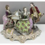 Large Dresden figural group of 18th C people around a Piano.