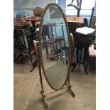 20th C gilt oval Cheval mirror.