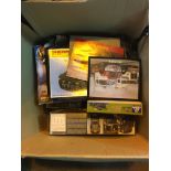 Box of military vehicles and Plane kits.