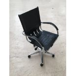 Retro chrome and leather desk chair.