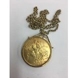 Gold plated silver chain and Victorian gold plated crown on pendant.