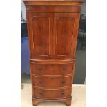 Reproduction Yew cocktail cabinet.