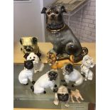 Quantity of pug ceramic dogs to include 19th Century examples.