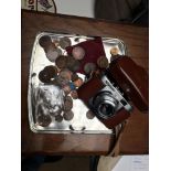 Voightlander camera and coins.