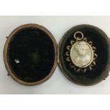 Roman Intaglio of a woman in Victorian curled gold mount and period case.