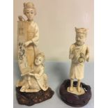 Meiji period finely carved Okimono of woman and child with scroll and a bone example.