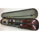 Vintage wooden cased violin and bow.