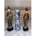 Two Chinese cloisonne figures and a vase.