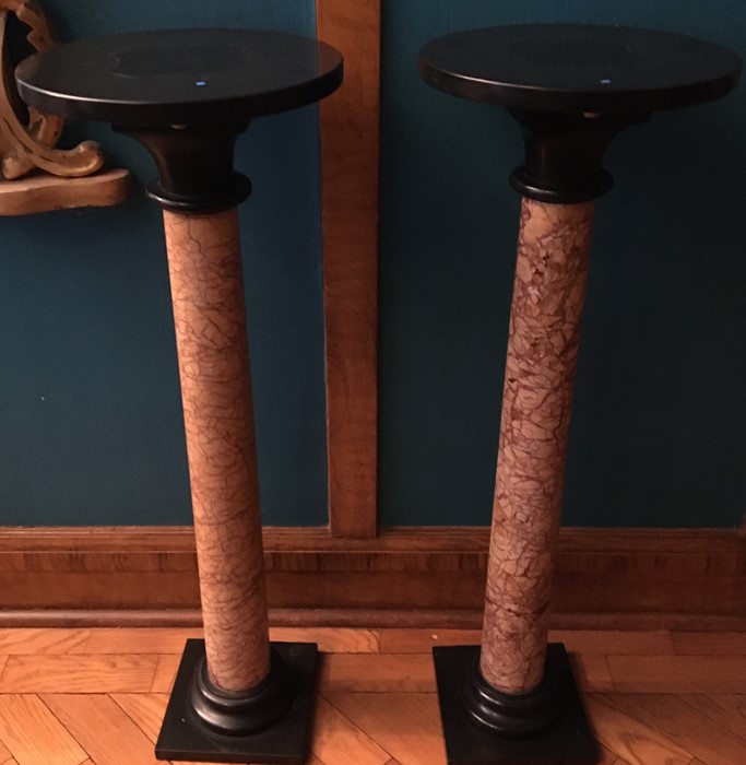 Pair of red and black marble Jardiniere stands.91 cm x 31 cm x 20 cm. These pillars are both broken