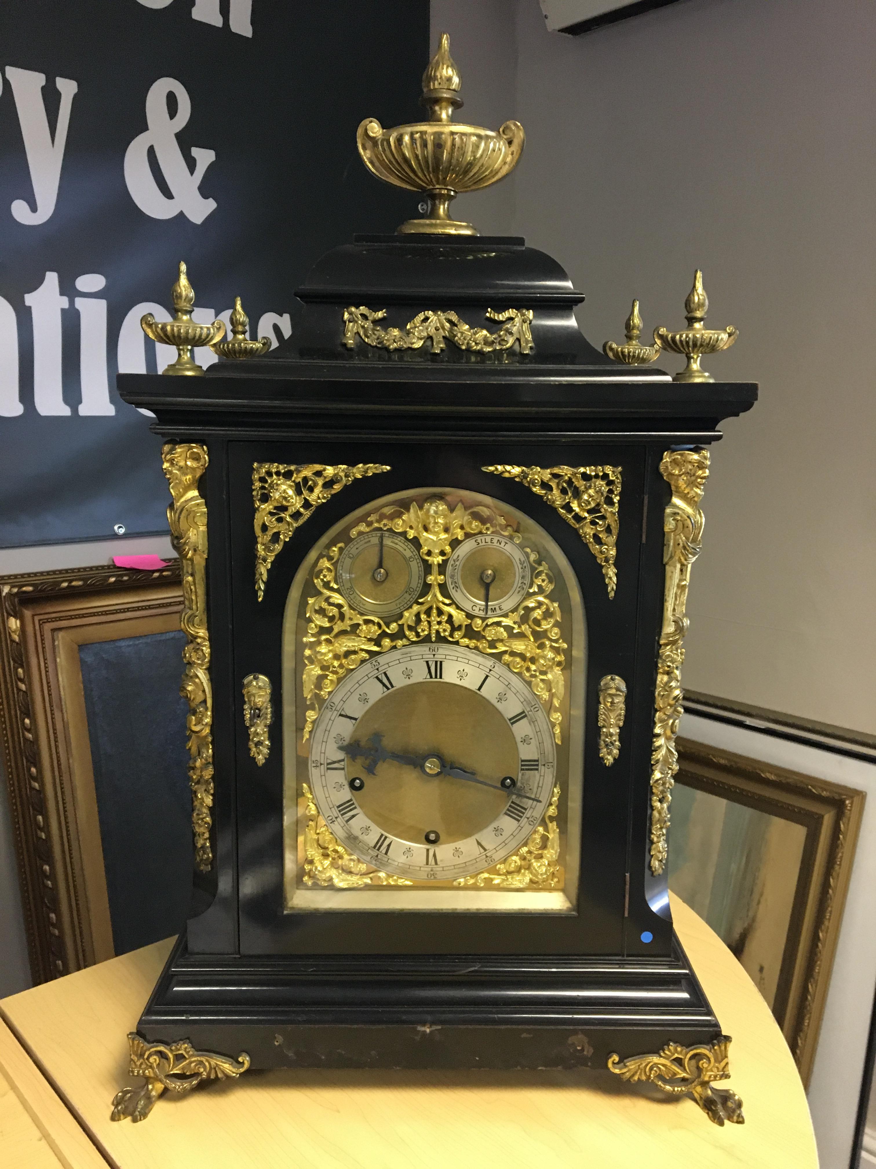 Early 19th C Ebonised Bracket Clock, striking on four gongs.