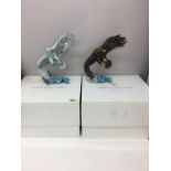 Two boxed Royal Doulton birds of prey in flight.