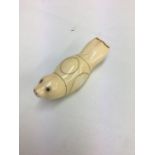 1930`s Innuit carved marine ivory figure of a seal.numbered to the underside.