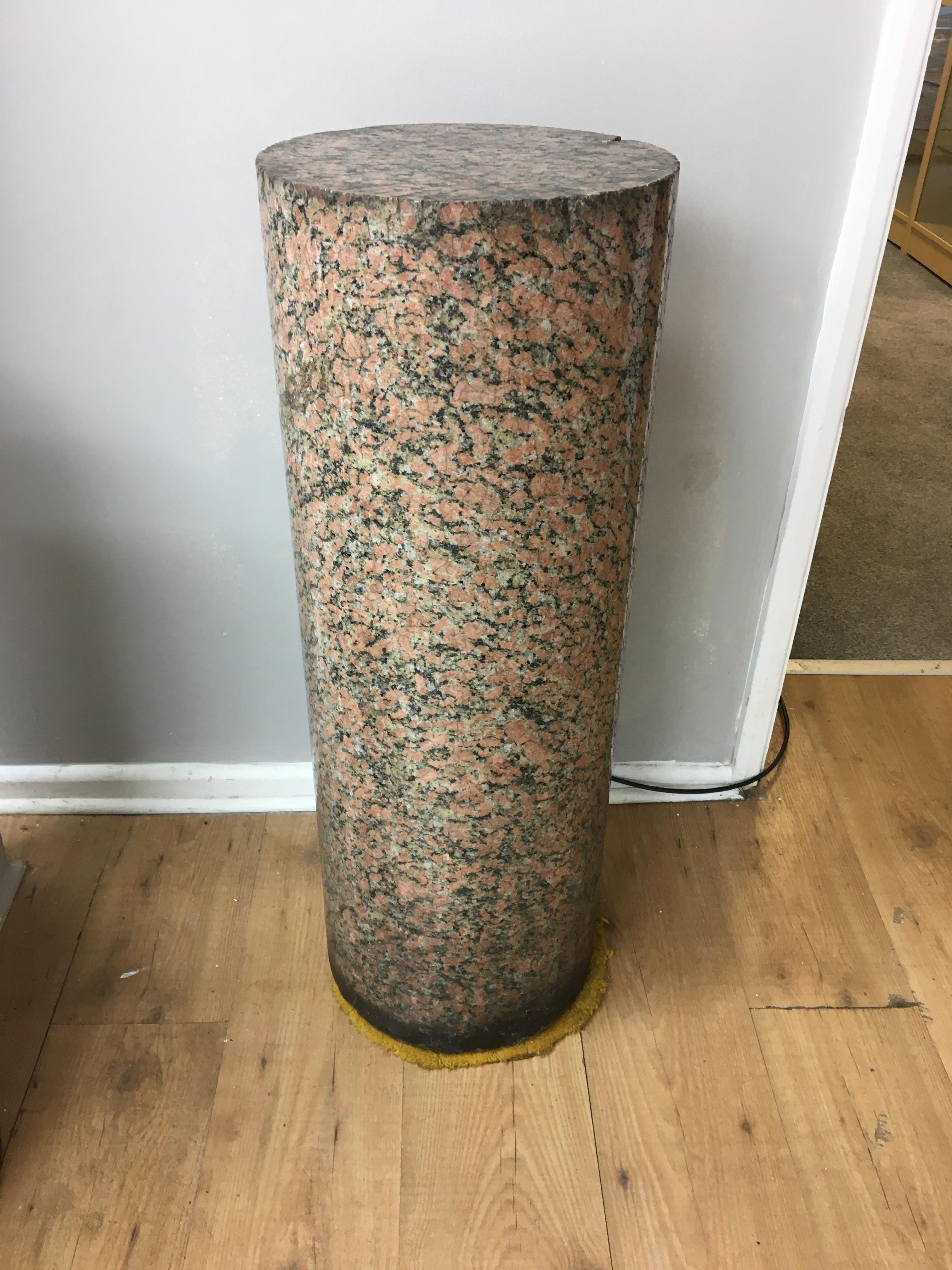 Very heavy large red marble circular column.