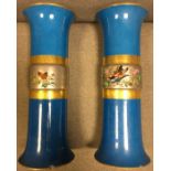 Pair of blue ground Vases with gilded middles bearing bird and butterfly decoration.