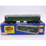 OO Gauge: A HORNBY DUBLO 3233 3-rail Co-Bo diesel locomotive in BR green numbered D5713. G in G box