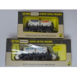 OO Gauge: A pair of rarer WRENN wagons to include: 2 x Six Wheel Milk Tank Wagons - W5013 and