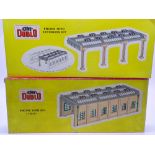 OO Gauge@ A HORNBY DUBLO 5005 Engine Shed Kit, together with a 5006 Shed Extension Kit, both