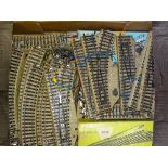 HO Gauge: A tray of vintage MARKLIN 3-rail track including electric points, straights, curves