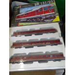 HO Gauge: A RIVAROSSI non powered VT08 3-car DMU (part boxed) together with an unbuilt REVELL