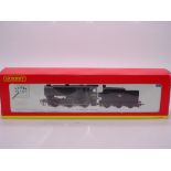 OO Gauge: A HORNBY R2344A Class Q1 steam locomotive - numbered 33006 - BR Black (weathered) livery -