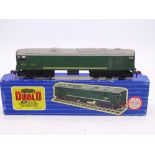 OO Gauge: A HORNBY DUBLO 3233 3-rail Co-Bo diesel locomotive in BR green numbered D5713. G in G box