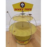 An ultra rare DINKY toys factory display stand. This appears to be a stand that was used either in a