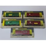OO Gauge: A group of rarer WRENN wagons to include: 5 x Horse Boxes - W4315P, W4315X, W4316 and 2