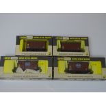 OO Gauge: A group of rarer WRENN wagons to include: 2 'Fyffes' Banana Vans W5022A and 2 x Banana