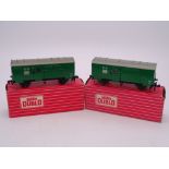 OO Gauge: A pair of HORNBY DUBLO 4316 Horse Boxes, both complete and with horse. VG in G-VG boxes (