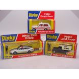 A group of DINKY Police vehicles: A 254 RANGE ROVER, a 264 ROVER 3500, and a 277 LAND ROVER - E -