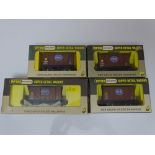 OO Gauge: A group of rarer WRENN wagons to include: 4 'Fyffes' Banana Vans - W5022 x 2 and W5022A