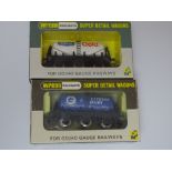 OO Gauge: A pair of rarer WRENN wagons to include: 2 x Six Wheel Milk Tank Wagons - W5013 and