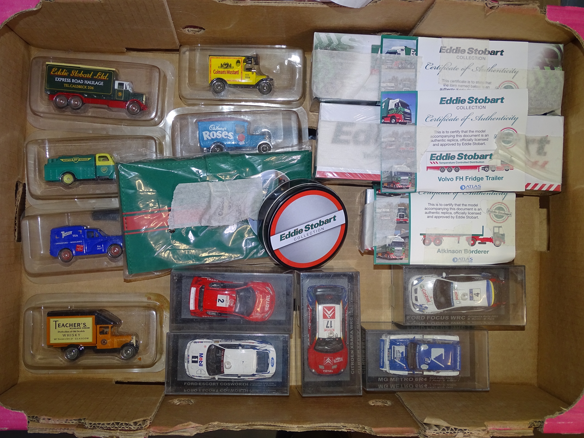 A tray of Diecast collectables by ATLAS and others - to include EDDIE STOBART and Rally Car examples