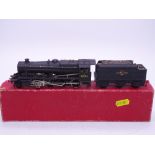 OO Gauge: A HORNBY DUBLO 2225 2-rail class 8F steam locomotive in BR black numbered 48109. G in F