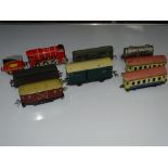 O Gauge Model Railways: A quantity of mixed rolling stock by various manufacturers to include some