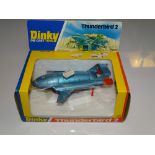 A DINKY 106 THUNDERBIRD 2 - Metallic Blue with black base and red legs version - E - Appears