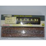 OO Gauge Model Railways: A WRENN W6101C Pullman Car Number 83 limited edition with white tables,